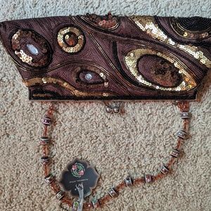 Beaded clutch bag.